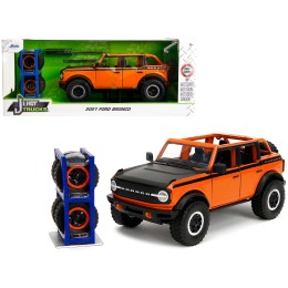 2021 Ford Bronco Open-Top Orange with Black Stripes and Hood with Extra Wheels 'Just Trucks' Series 1/24 Diecast Model Car by Jada