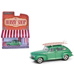 1946 Ford Fordor Super Deluxe Green Metallic with White Interior and Roof Rack with Surfboards 'The Hobby Shop' Series 16 1/64 Diecast Model Car by Greenlight