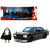 1971 Nissan Skyline GT-R RHD (Right Hand Drive) Black with Silver Stripe and Mikey Diecast Figure 'Tokyo Revengers' (2021) TV Series 'Anime Hollywood Rides' Series 1/24 Diecast Model Car by Jada