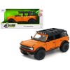 2021 Ford Bronco Orange with Black Stripes and Roof Rack 'Just Trucks' Series 1/24 Diecast Model Car by Jada